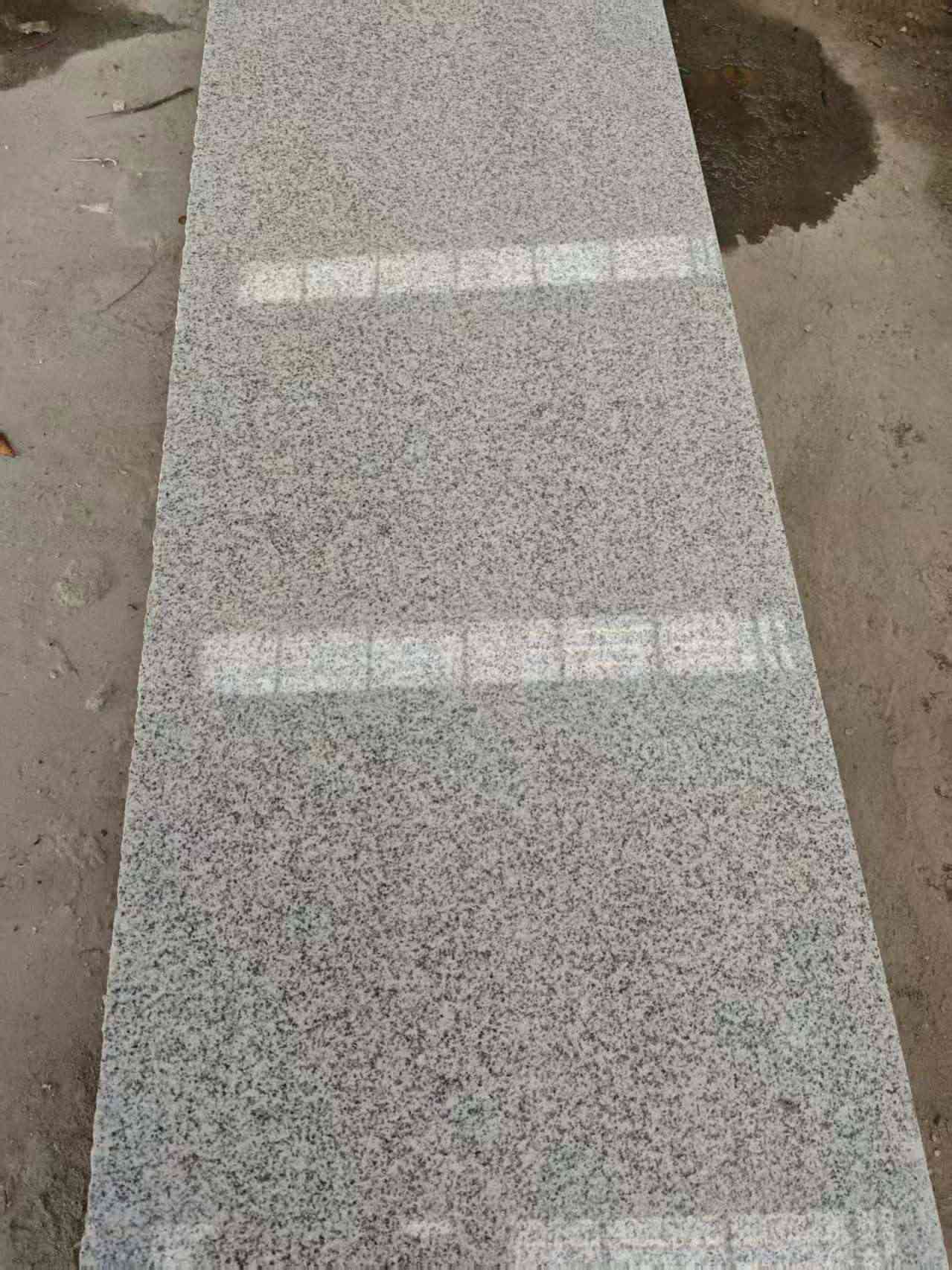 张掖芝麻白光面毛板